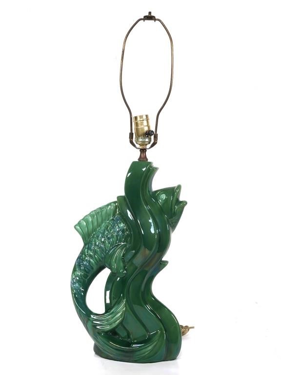 Appraisal: Green glaze fish pottery lamp Lamp has the look or