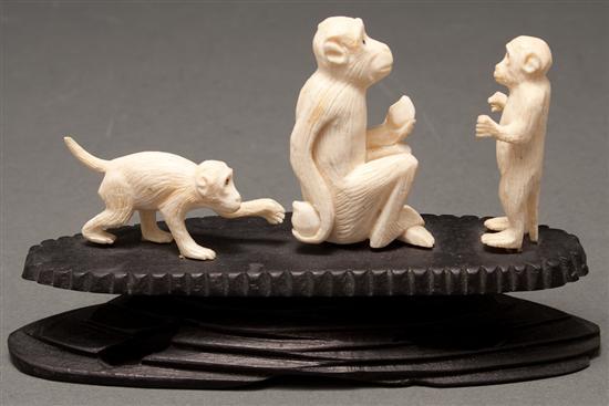 Appraisal: Japanese carved ivory monkey figural group late th century mounted