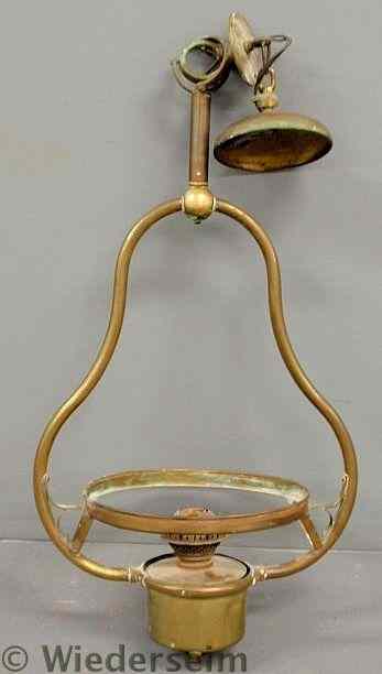 Appraisal: Gimbaled brass oil lamp converted to electricity lacking shade h