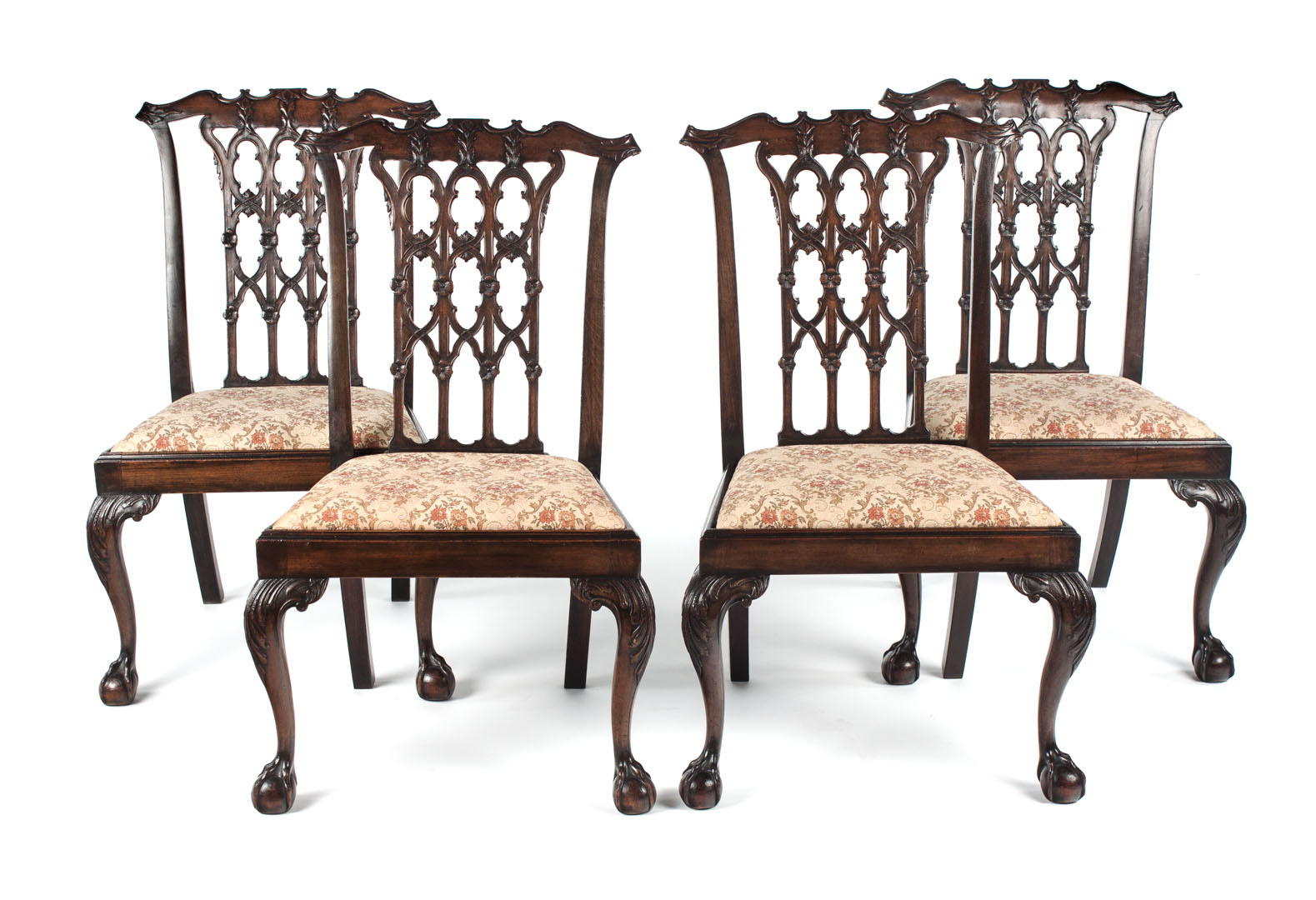 Appraisal: Gothic Chippendale style mahogany dining chairs carved and pierced vertical