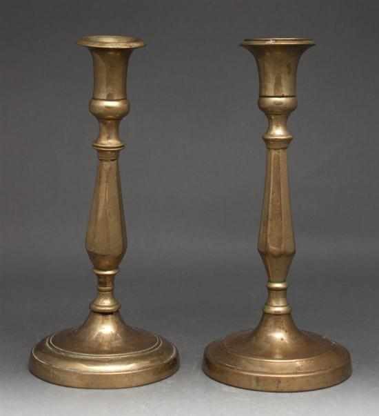 Appraisal: Pair of Russian turned brass candlesticks early th century Estimate