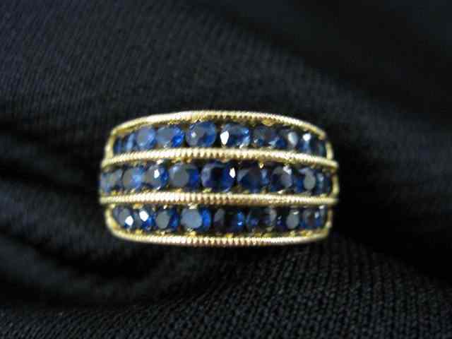 Appraisal: Sapphire Ring rich blue gems totaling carats in triple band