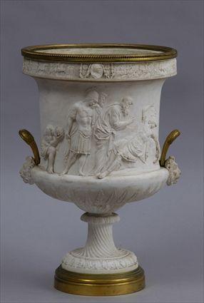 Appraisal: LOUIS XVI-STYLE GILT-BRONZE-MOUNTED WHITE POTTERY URN The beaded rim above