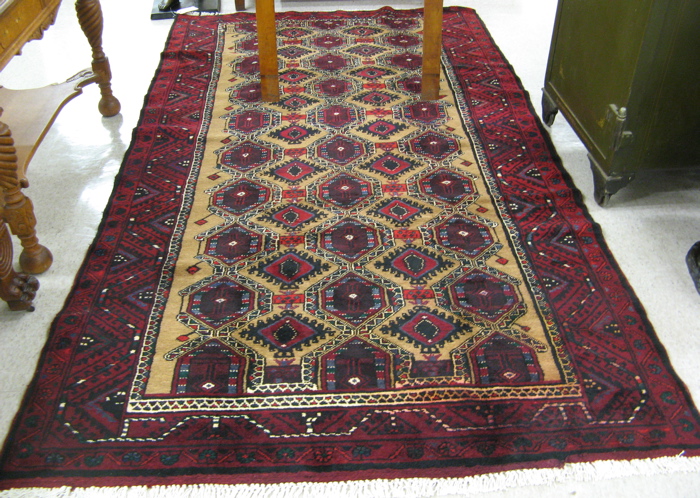 Appraisal: PERSIAN ILATI TRIBAL CARPET overall geometric medallion design arranged in