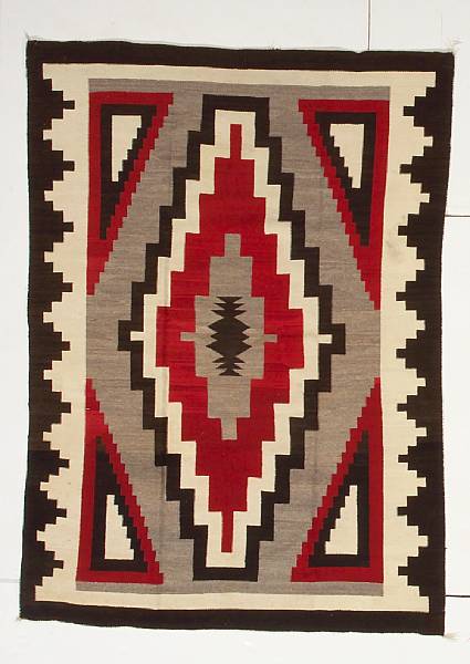 Appraisal: A Navajo rug The central stepped diamond flanked at each