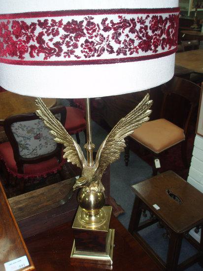 Appraisal: Additional Lot A gilt brass table lamp with eagle surmount