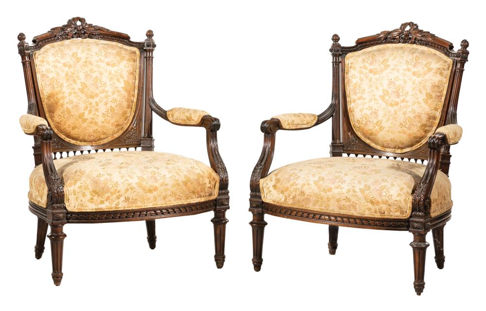 Appraisal: Pair of Antique Louis XVI Carved Mahogany Armchairs beribboned fluted