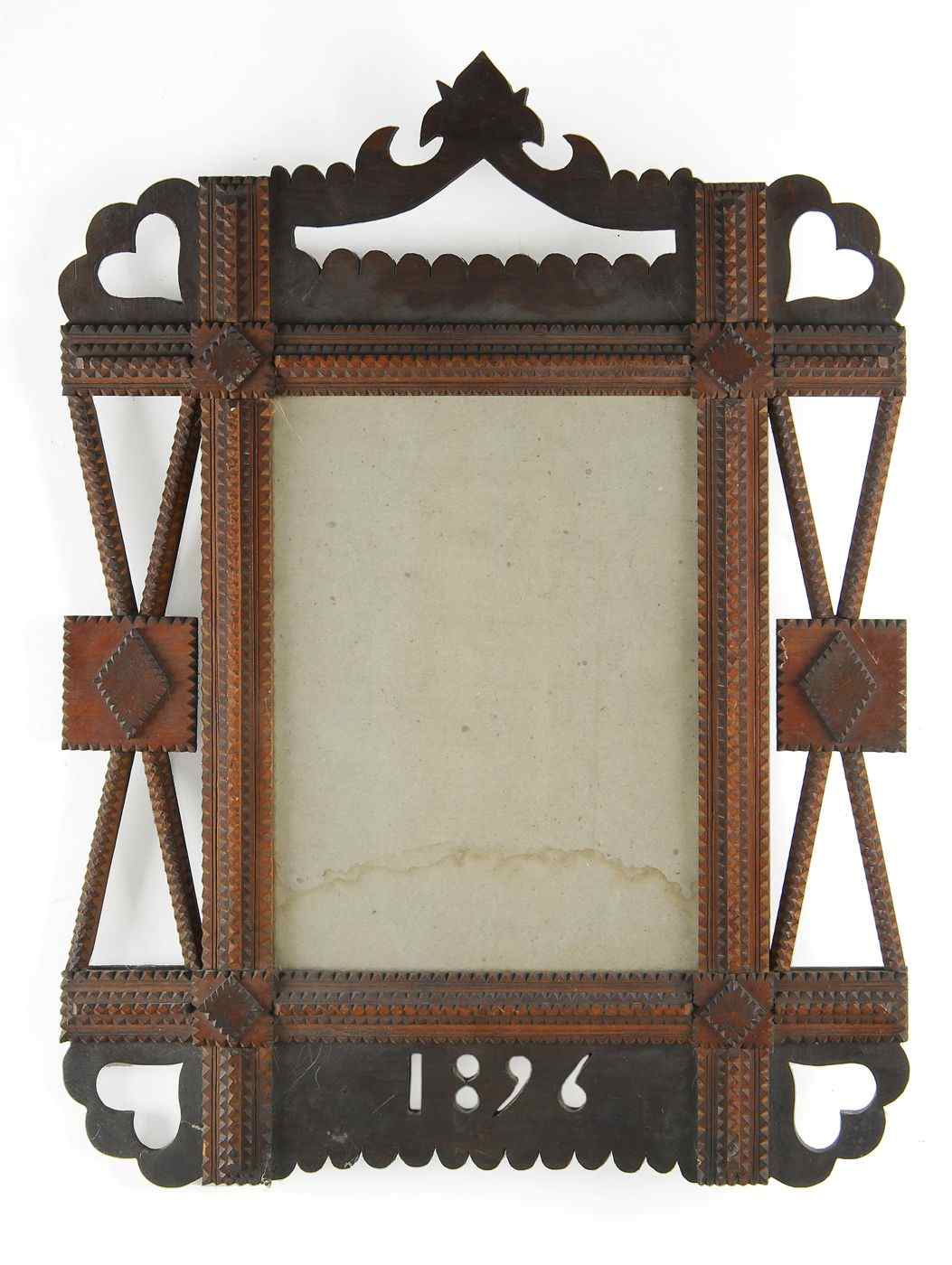 Appraisal: TRAMP ART FRAMEWith typical tramp art moldings Heart corners and