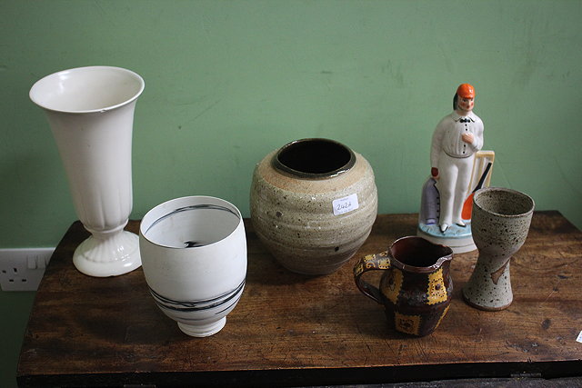 Appraisal: A BROWN GLAZED STUDIO POTTERY VASE together with a white