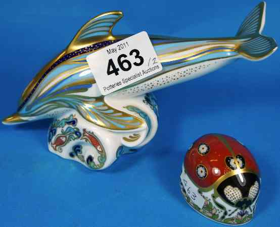 Appraisal: Royal Crown Derby Paperweights Dolphin gold stopper and Ladybird Silver