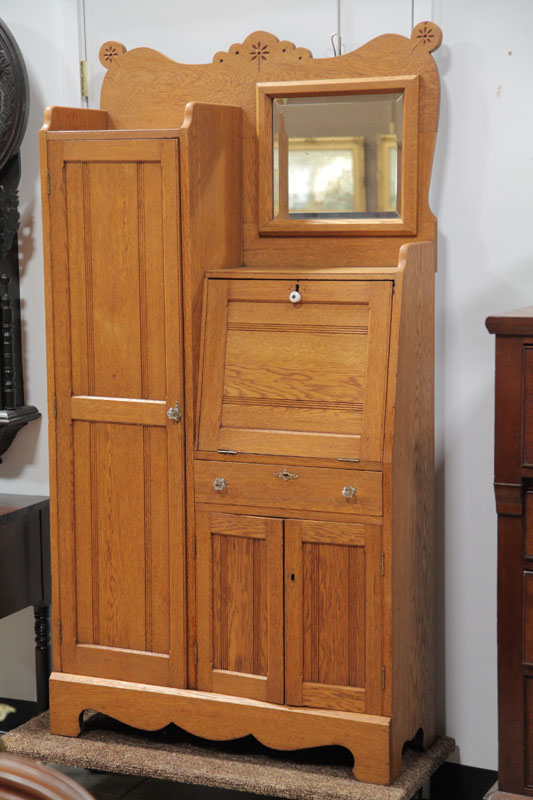 Appraisal: SIDE BY SIDE SECRETARY BOOKCASE Oak having an incised door