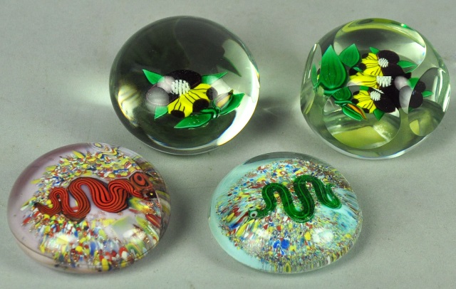 Appraisal: Four Glass PaperweightsTwo with flowers and two with snakes Red