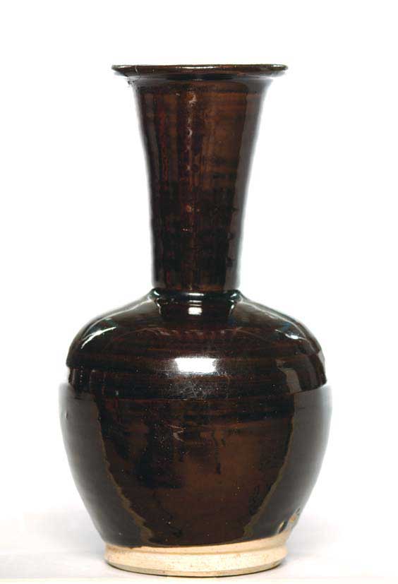 Appraisal: JIN DYNASTY HENAN GLAZED JAR Chinese Jin Dynasty Henan black