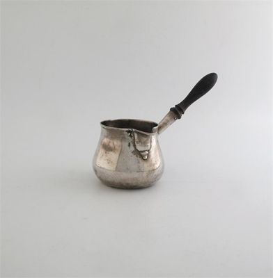 Appraisal: A George III brandy saucepan bellied with a turned wooden