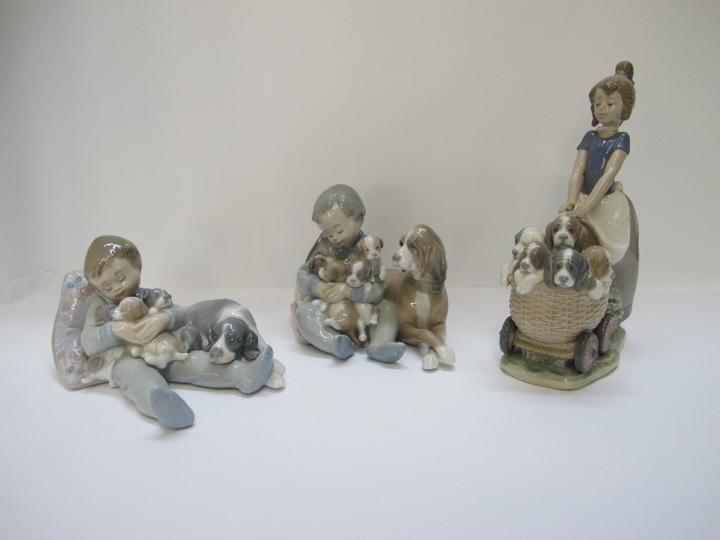 Appraisal: Three Lladro figures including Sweet Dreams New Playmates and a