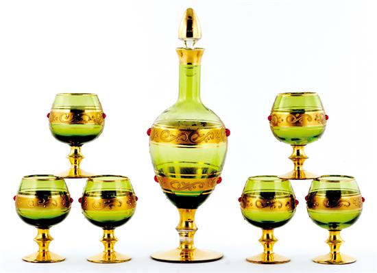 Appraisal: Bohemian gilt and bejeweled stemware and decanter set green glass