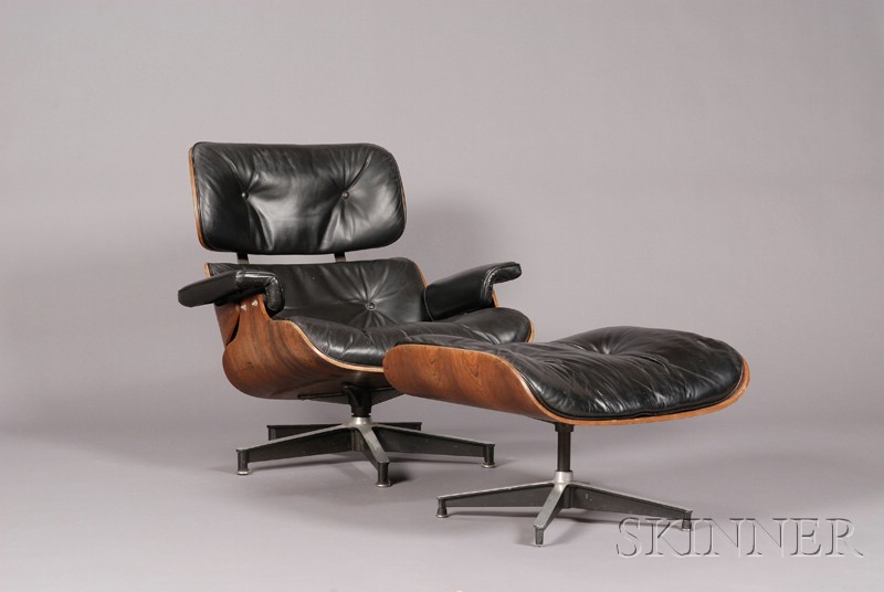 Appraisal: Lounge Chair and Ottoman Black leather and laminated rosewood Possibly