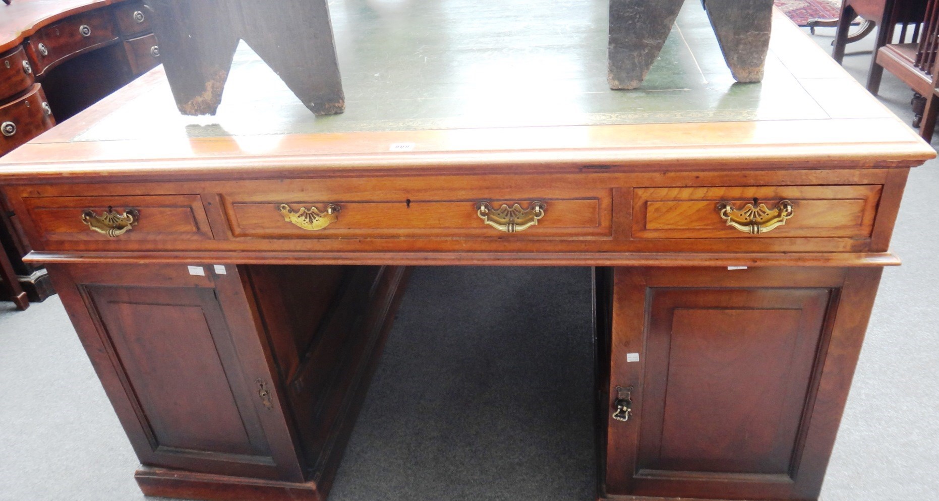 Appraisal: A late th century American walnut partners desk with six