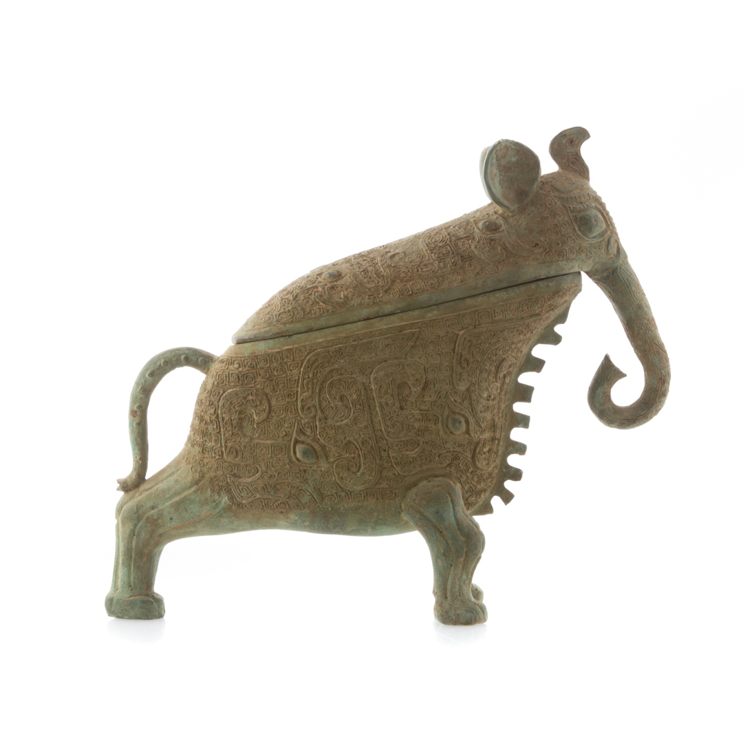 Appraisal: Chinese Chou style bronze wine vessel elephant form with removable