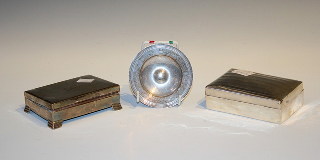 Appraisal: TWO SILVER CIGARETTE CASES with hinged rising lid and cedar