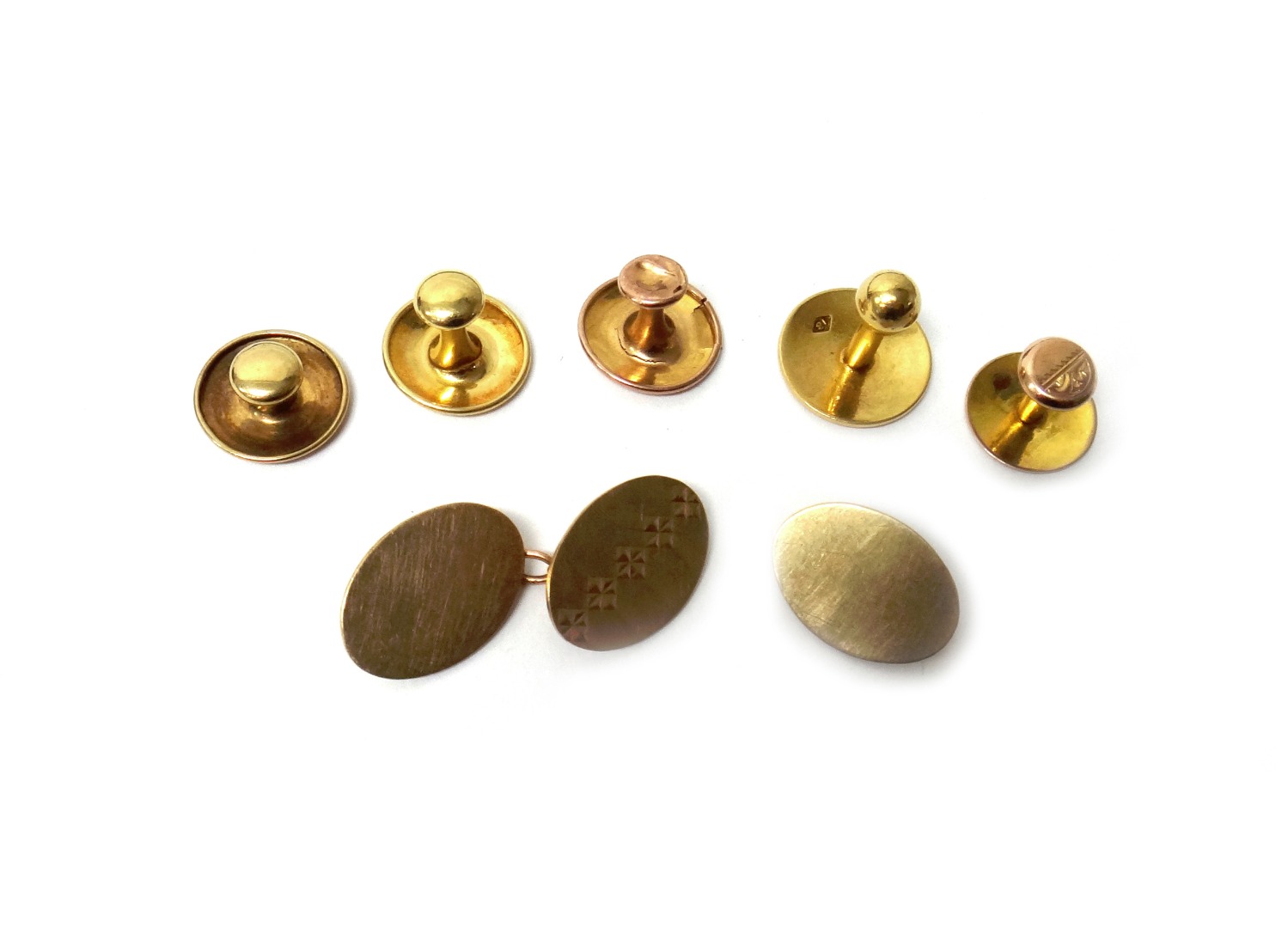 Appraisal: Two gold dress studs detailed CT and combined weight gms