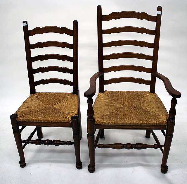 Appraisal: A SET OF SIX OAK LADDER BACK DINING CHAIRS with