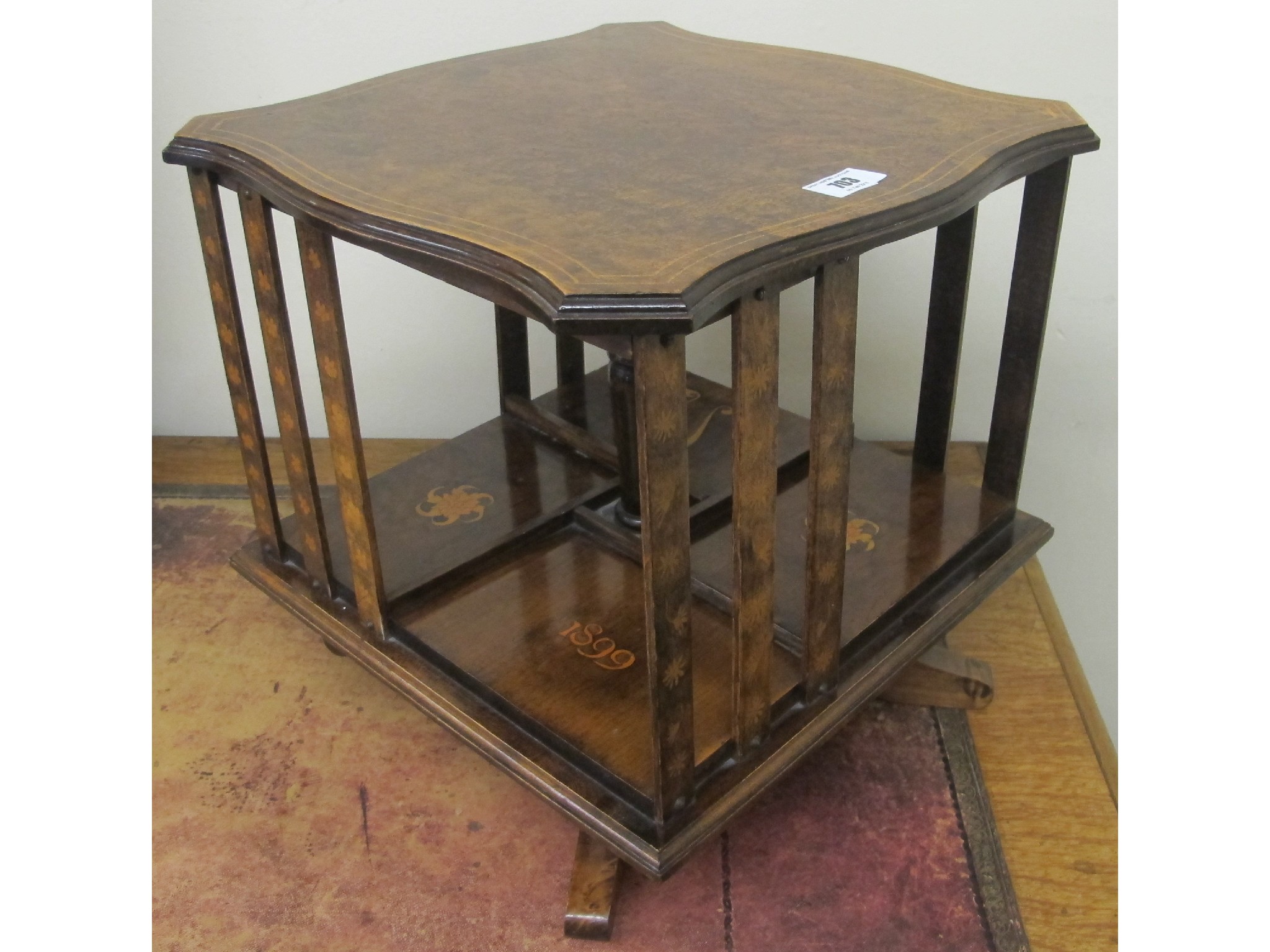 Appraisal: A revolving table book stand inlaid