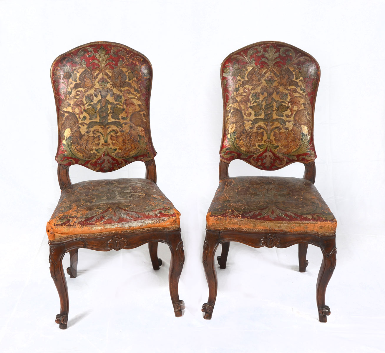 Appraisal: CARVED WALNUT SIDE CHAIRS Walnut side chairs having a carved