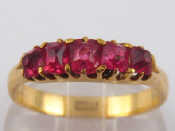 Appraisal: An carat gold five stone red spinel ring approx mm