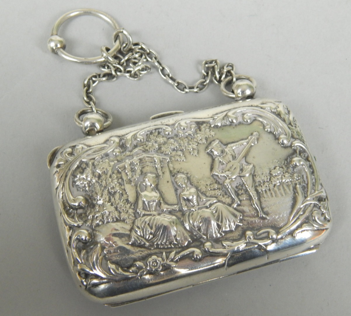 Appraisal: An Edwardian silver purse with figural and landscape decoration hallmark