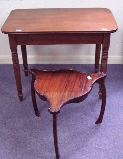 Appraisal: A th Century mahogany table cm wide and a shaped