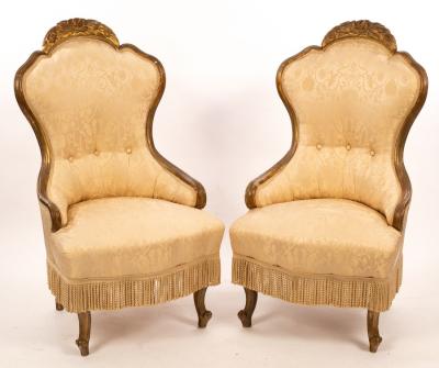 Appraisal: A pair of Victorian gilt framed salon chairs with arch