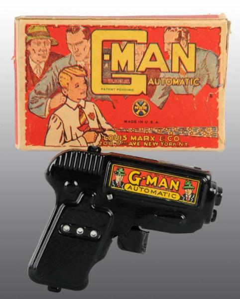 Appraisal: Marx G-Man Automatic Toy Sparkler Gun Description Includes original box