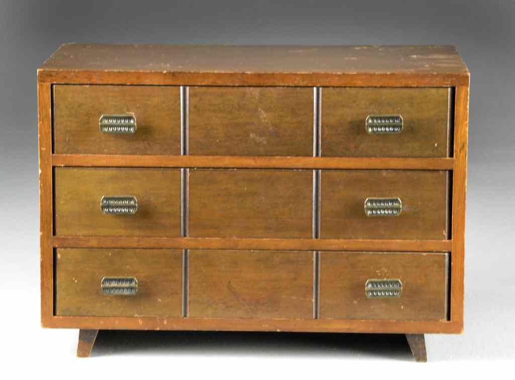 Appraisal: A Mid Century Modern Miniature Chest Of DrawersHaving drawers with