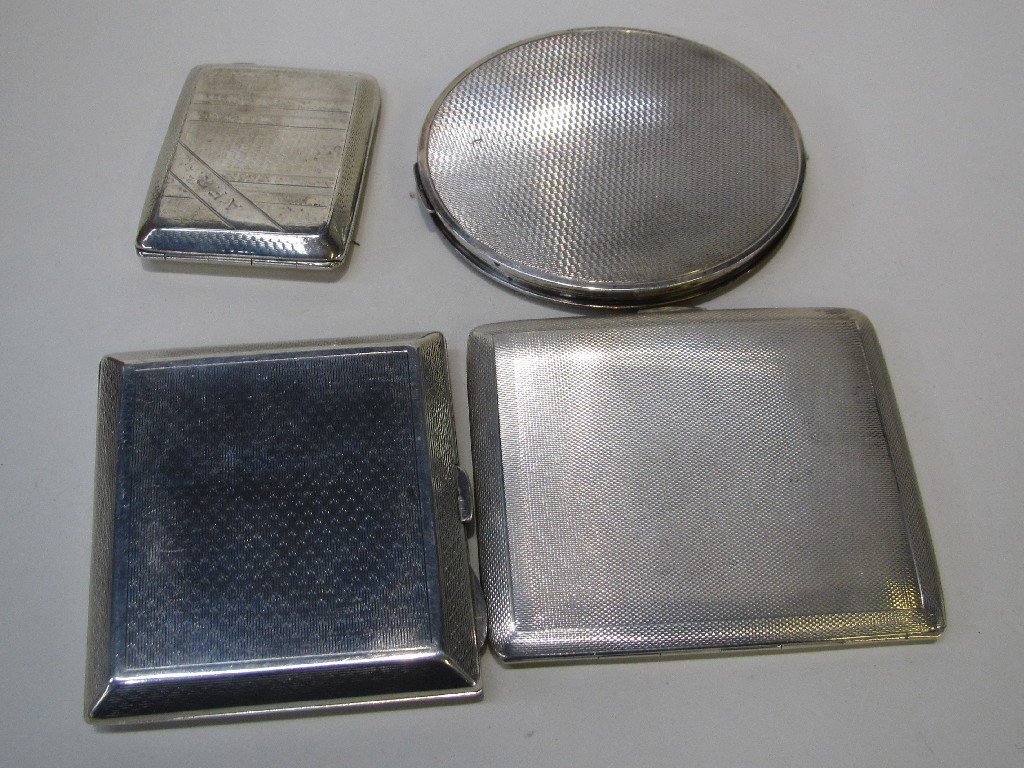 Appraisal: Lot comprising three silver cigarette cases and a compact