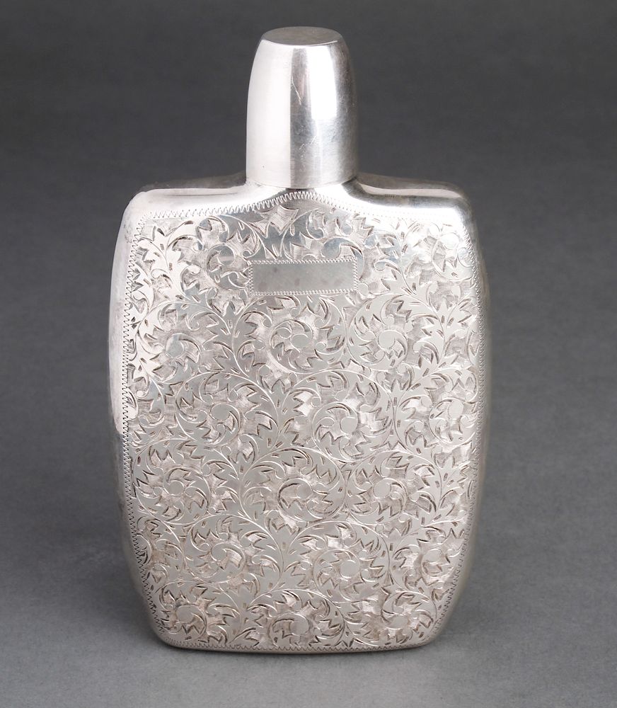 Appraisal: Sterling Silver Engraved Floral Motif Convex Flask Sterling silver engraved