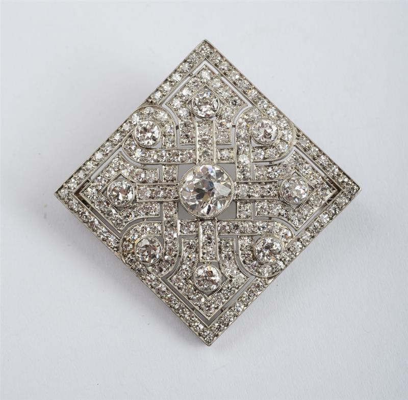 Appraisal: ART DECO PLATINUM AND DIAMOND BROOCH Pierced lozenge shaped centering