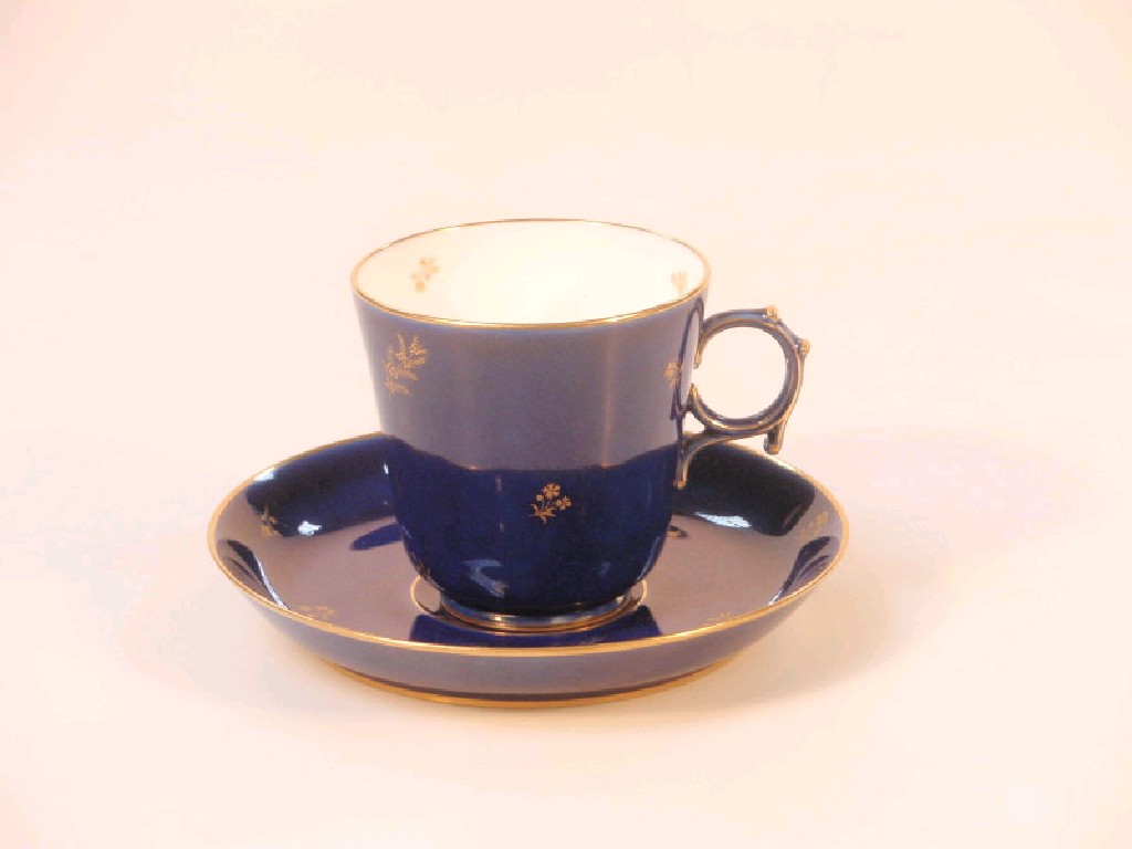 Appraisal: A Sevres porcelain cup and saucer decorated with gilt foliate