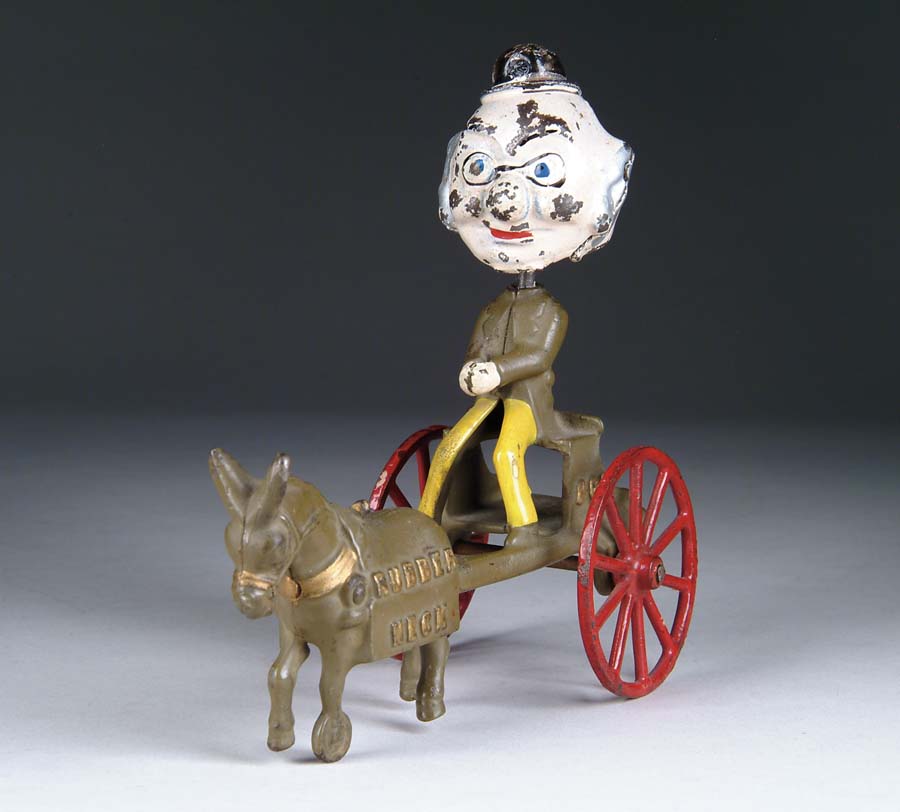 Appraisal: KENTON RUBBER NECK FOXEY GRAMPA WAGON Comical cart with Foxey