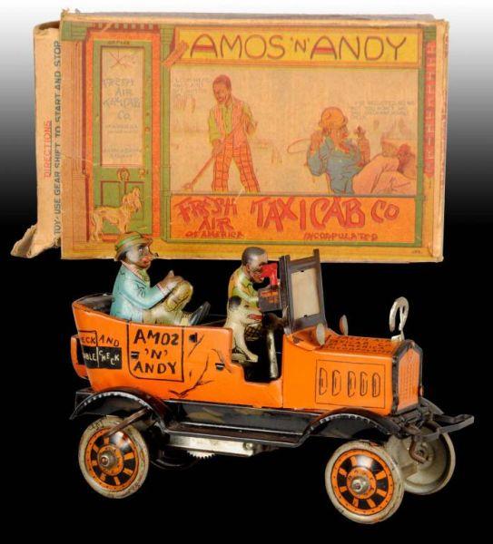 Appraisal: Marx Tin Wind-Up Amos N Andy Taxi Toy Description Includes