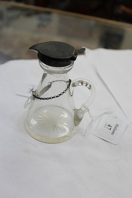 Appraisal: AN EARLY TH CENTURY GLASS AND SILVER MOUNTED TOT DECANTER