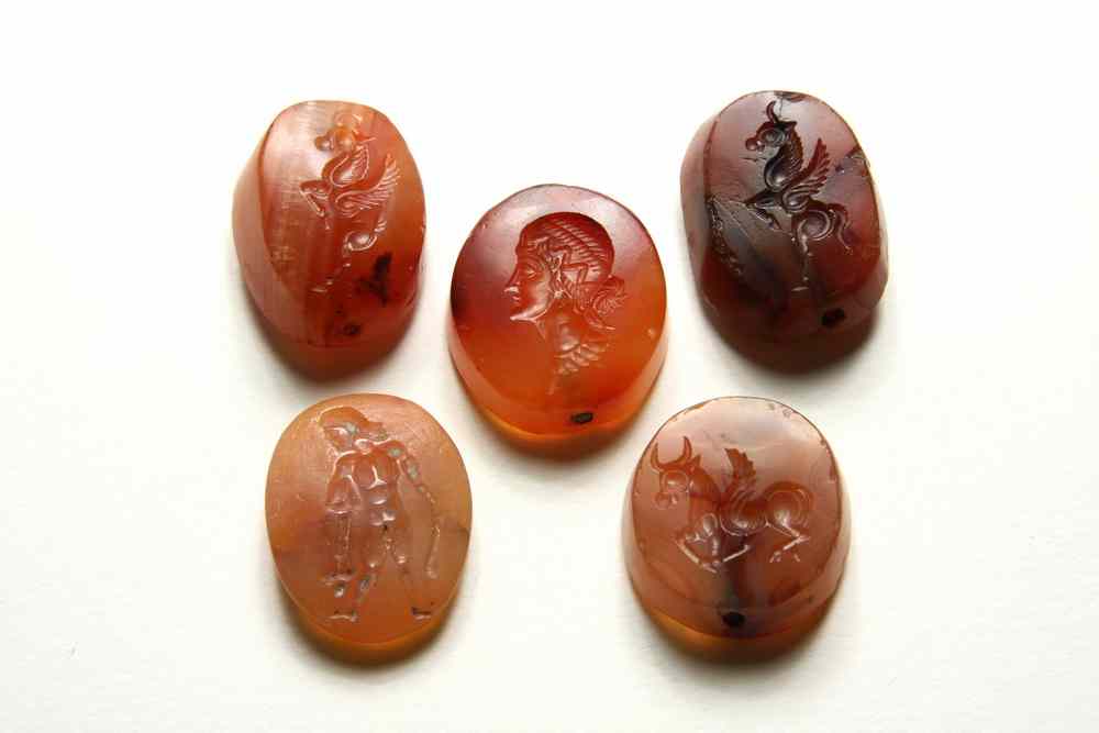 Appraisal: ROMAN INTAGLIO BEADS - Large Carnelian Beads of Roman origin