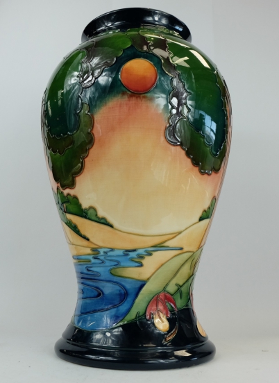 Appraisal: Moorcroft large vase decorated with trees and landscape design signed