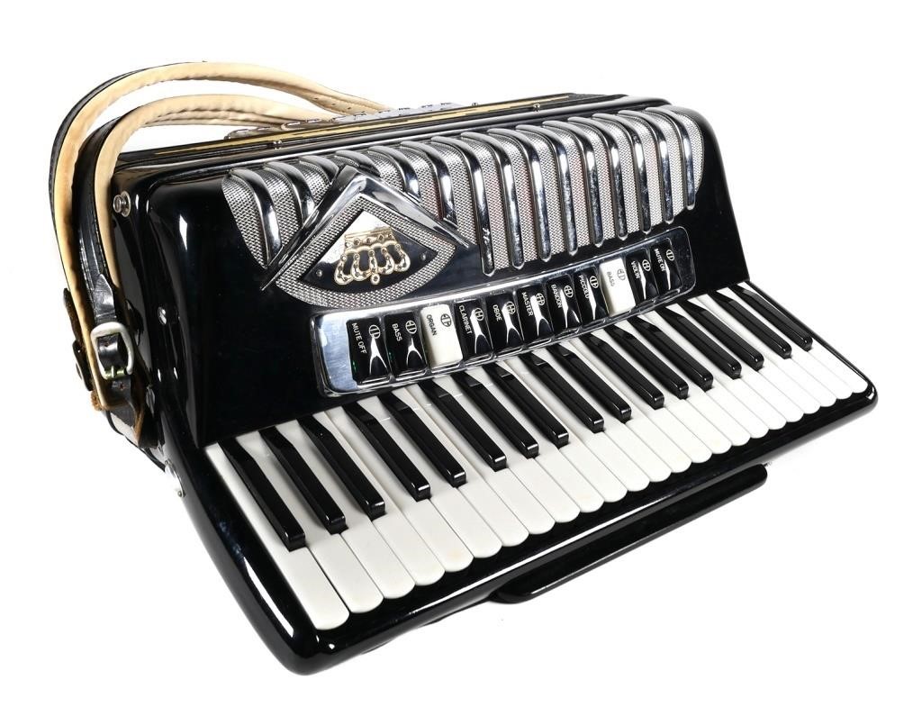 Appraisal: Crown piano accordion featuring treble keys and registers and bass