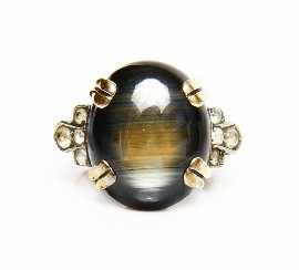 Appraisal: A ct gold black sapphire colourless stone and one diamond