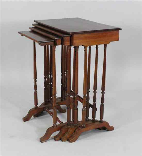 Appraisal: An Edwardian inlaid mahogany quartetto nest of tables on turned