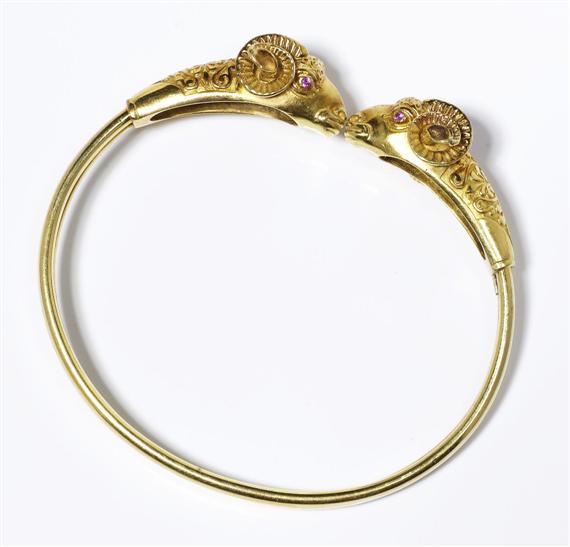 Appraisal: GOLD ARM CLASP Yellow gold g Decorative arm clasp the