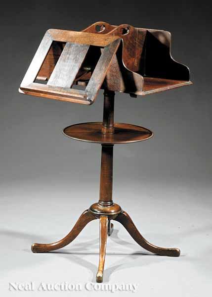 Appraisal: A Federal-Style Walnut Revolving Bookmill Stand early th c compartmentalized