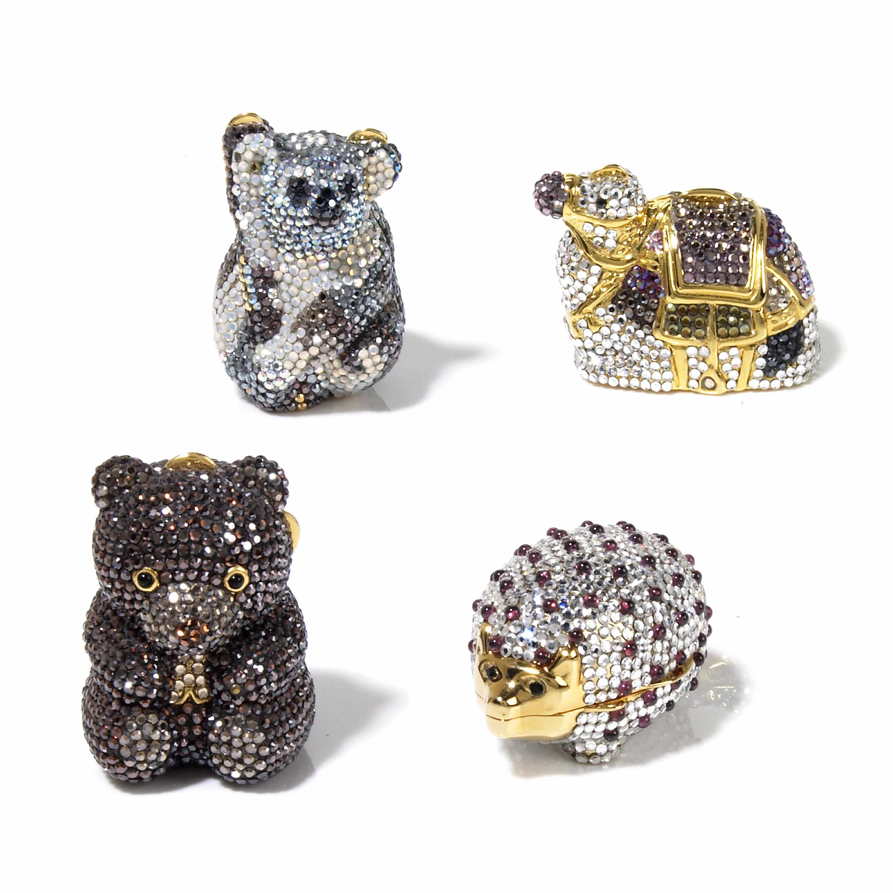 Appraisal: A collection of crystal animal pillboxes comprising a camel koala