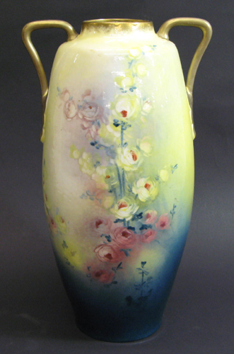 Appraisal: AN AUSTRIAN PORCELAIN FLOWER VASE with gilt shaped handles Hand